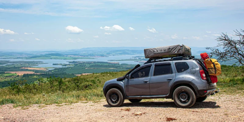 A Subaru with a rooftop tent