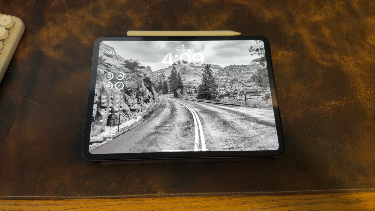 nomad-leather-folio-open iPad Pro 11 with Nomad Leather Folio open flat showing Apple Pencil attached