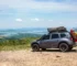 A Subaru with a rooftop tent